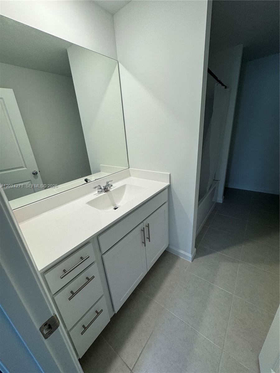 693 Carlyle Way Fort Pierce, FL 34947 - Photo 9 of 19 a utility room with dryer and washer