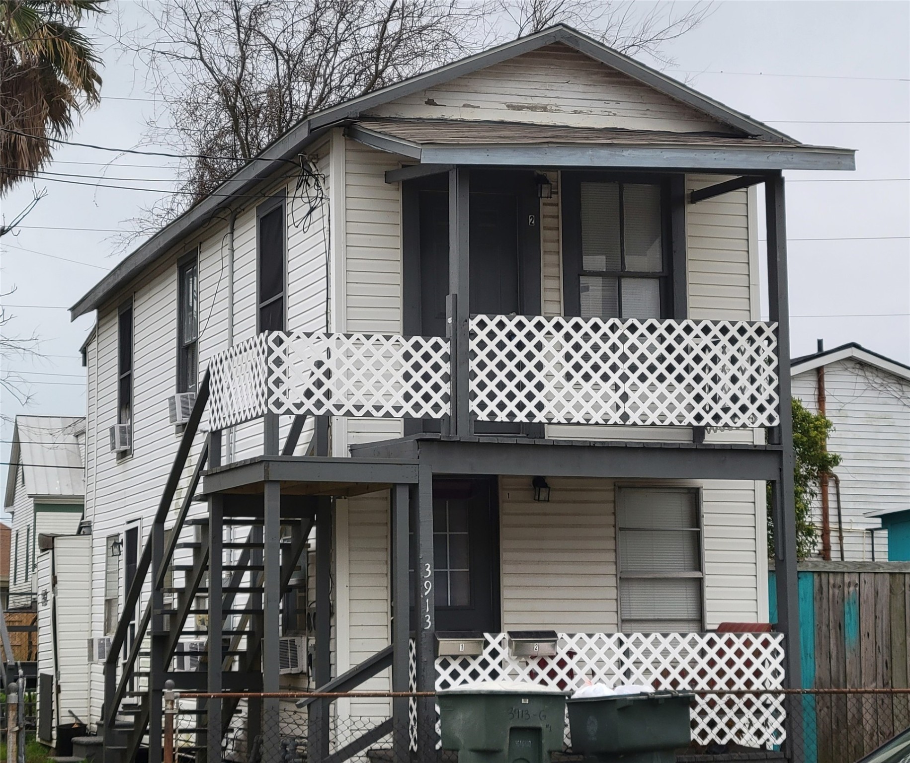 3913 Winnie Street, Unit UP Galveston, TX 77550 - Photo 8 of 9 front view of a house