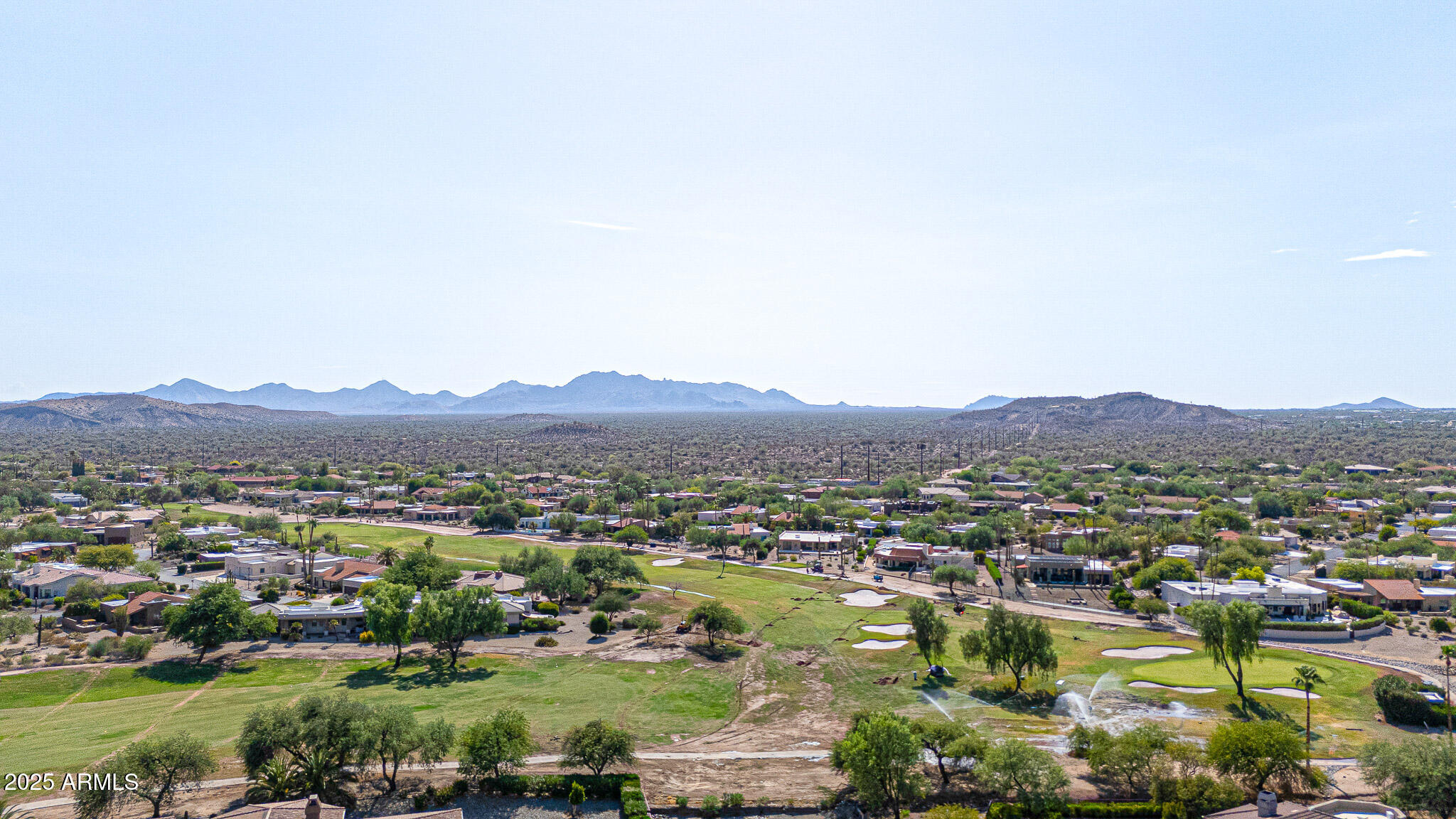 18610 East Gemmill Drive Rio Verde, AZ 85263 - Photo 20 of 65 a view of a city with mountains in the background