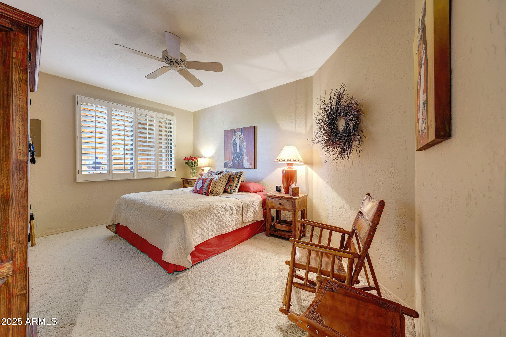 18610 East Gemmill Drive Rio Verde, AZ 85263 - Photo 26 of 65 a bed room with a bed and a chair