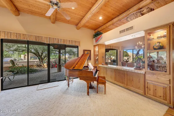 a outdoor living space with patio furniture and a potted plant