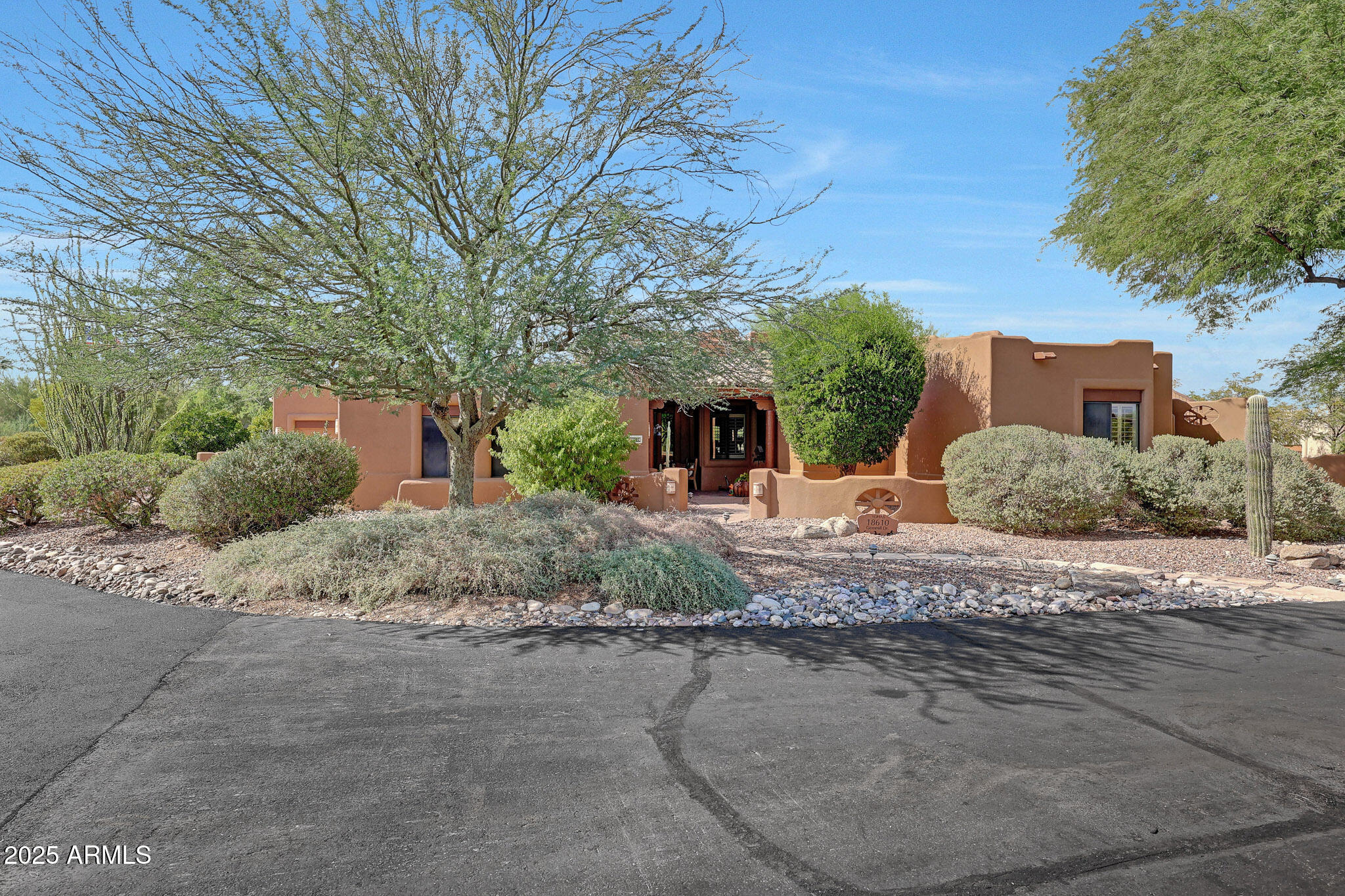 18610 East Gemmill Drive Rio Verde, AZ 85263 - Photo 3 of 65 a view of a house with a yard and large tree