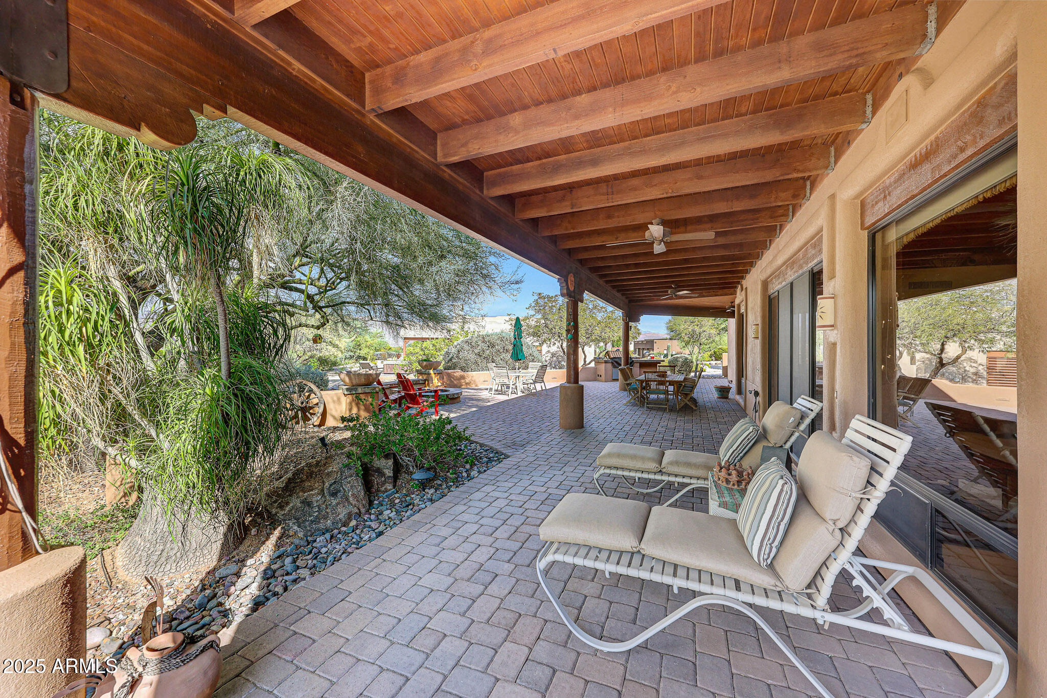 18610 East Gemmill Drive Rio Verde, AZ 85263 - Photo 36 of 53 a outdoor living space with patio furniture and a potted plant