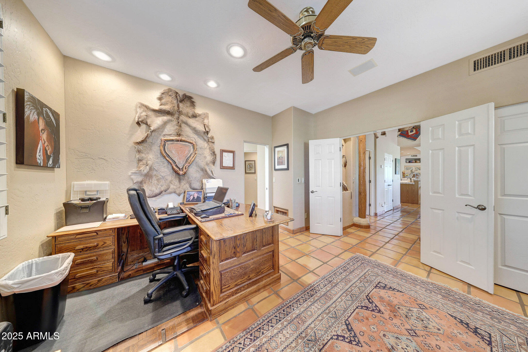 18610 East Gemmill Drive Rio Verde, AZ 85263 - Photo 41 of 65 a view of a livingroom with furniture and a ceiling fan