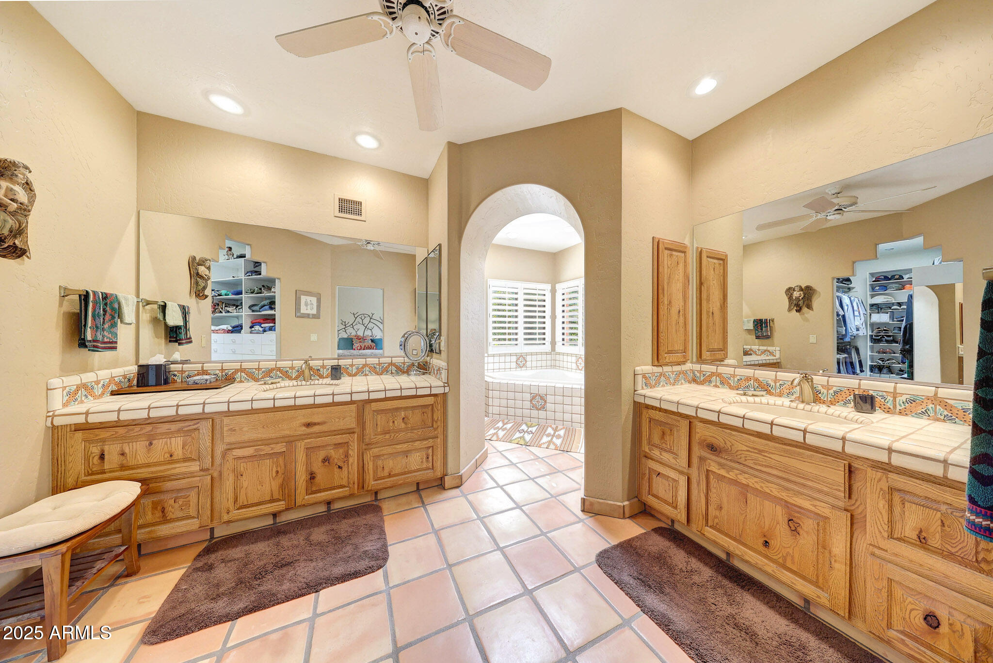18610 East Gemmill Drive Rio Verde, AZ 85263 - Photo 43 of 53 a large bathroom with a large mirror vanity and sink