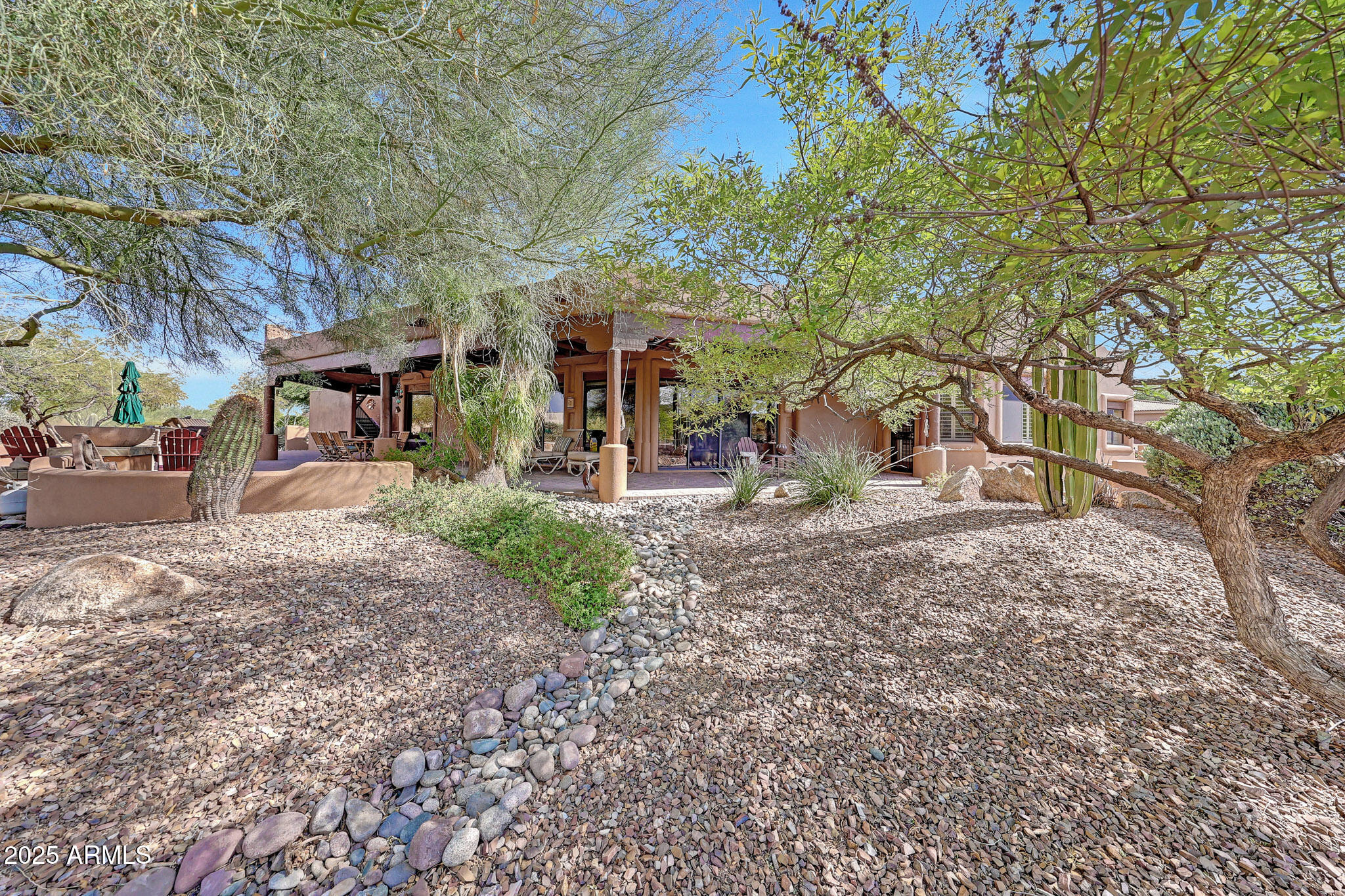 18610 East Gemmill Drive Rio Verde, AZ 85263 - Photo 45 of 65 a view of a yard with plants and trees