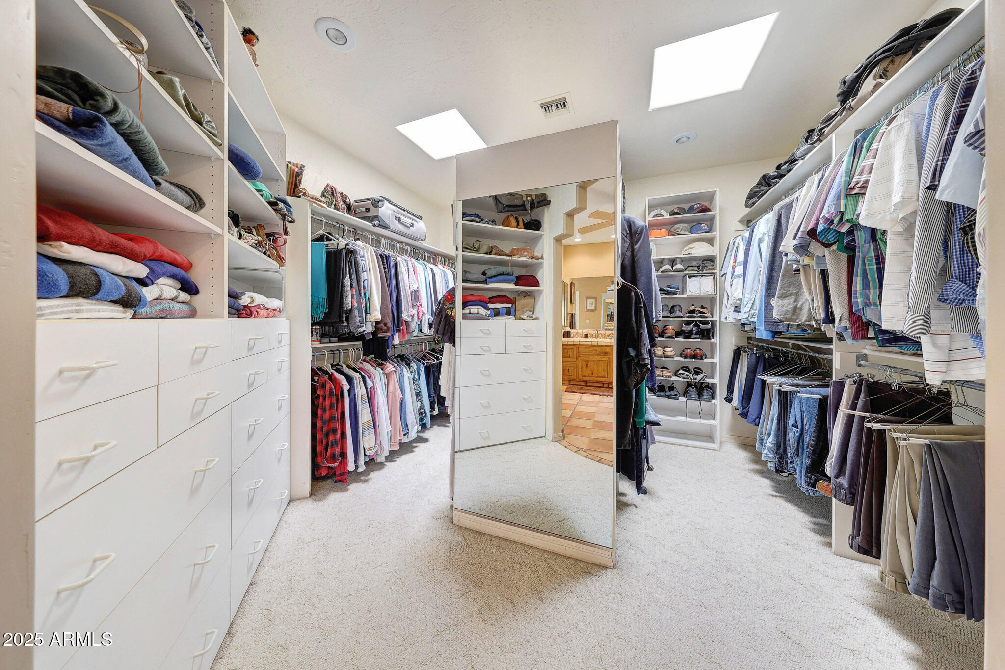 18610 East Gemmill Drive Rio Verde, AZ 85263 - Photo 46 of 53 a view of walk in closet with clothes