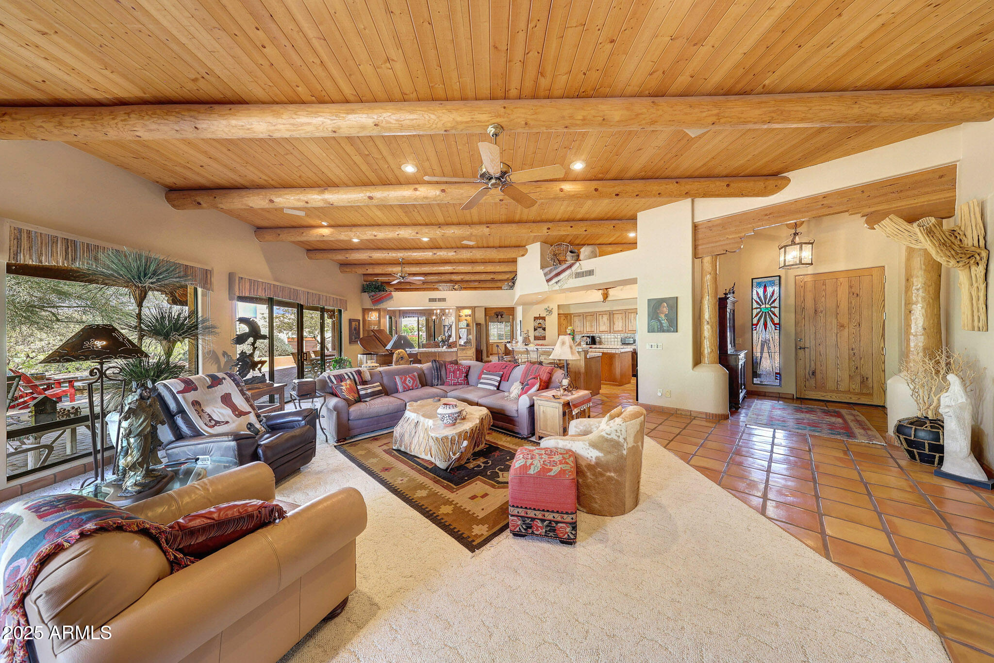 18610 East Gemmill Drive Rio Verde, AZ 85263 - Photo 7 of 65 a living room with lots of furniture and a chandelier