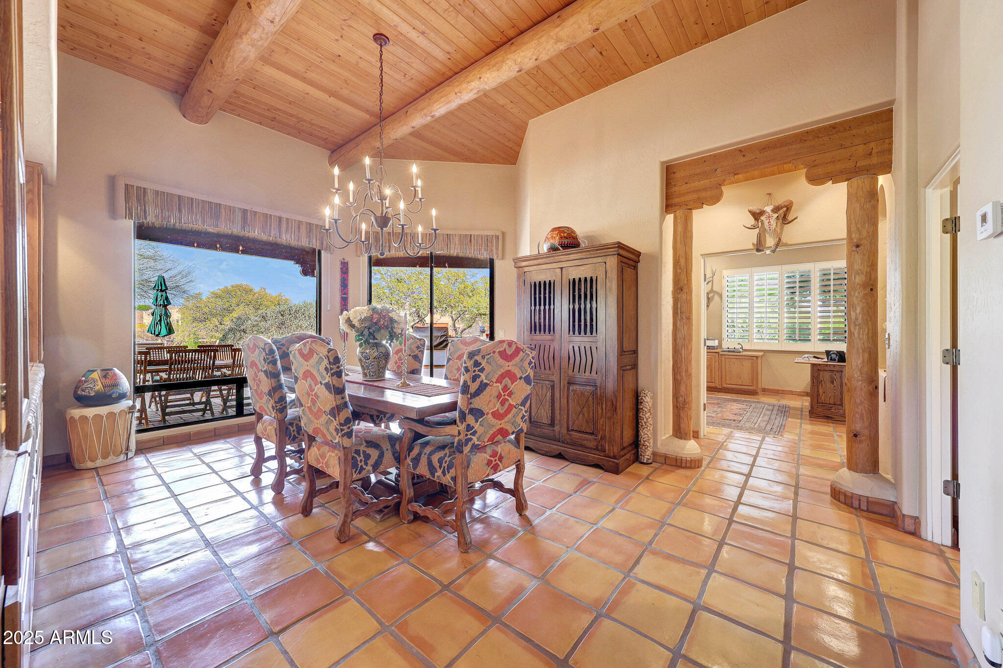 18610 East Gemmill Drive Rio Verde, AZ 85263 - Photo 9 of 53 a view of a dining room with furniture wooden floor and chandelier