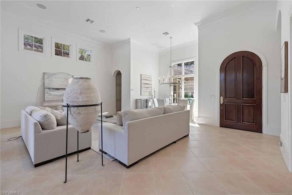 15655 Villoresi Way Naples, FL 34110 - Photo 17 of 47 a living room with furniture