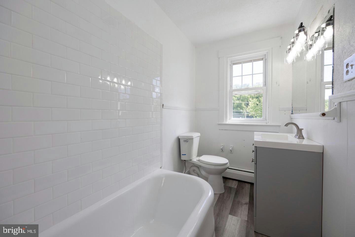 337 Stuart Avenue Downingtown, PA 19335 - Photo 13 of 19 a bathroom with a sink a toilet and shower