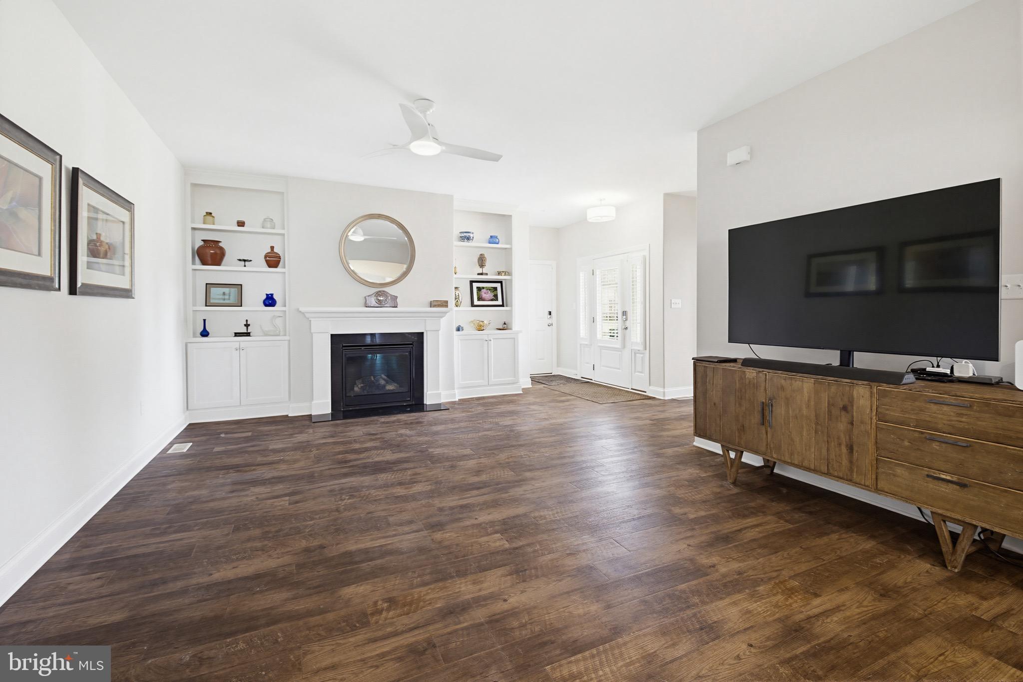 361 Meadow Rose Drive Lititz, PA 17543 - Photo 8 of 39 a living room with furniture and a flat screen tv