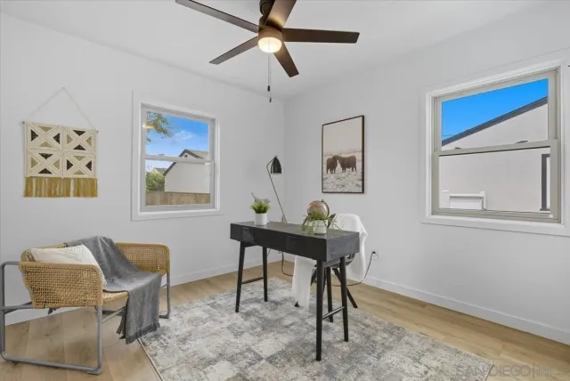 a view of a workspace with furniture