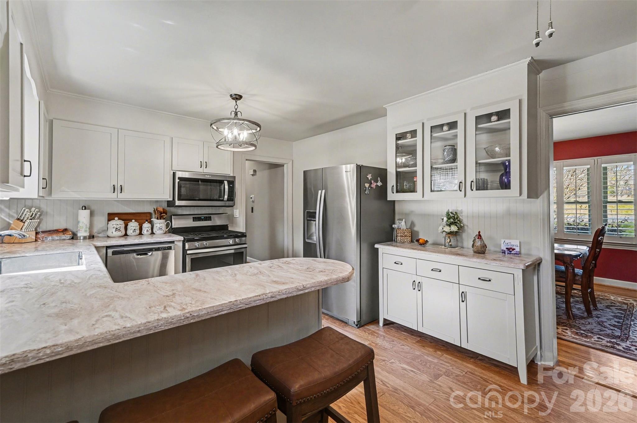 2008 Kings Road Shelby, NC 28150 - Photo 11 of 37 a kitchen with stainless steel appliances a stove refrigerator sink and microwave