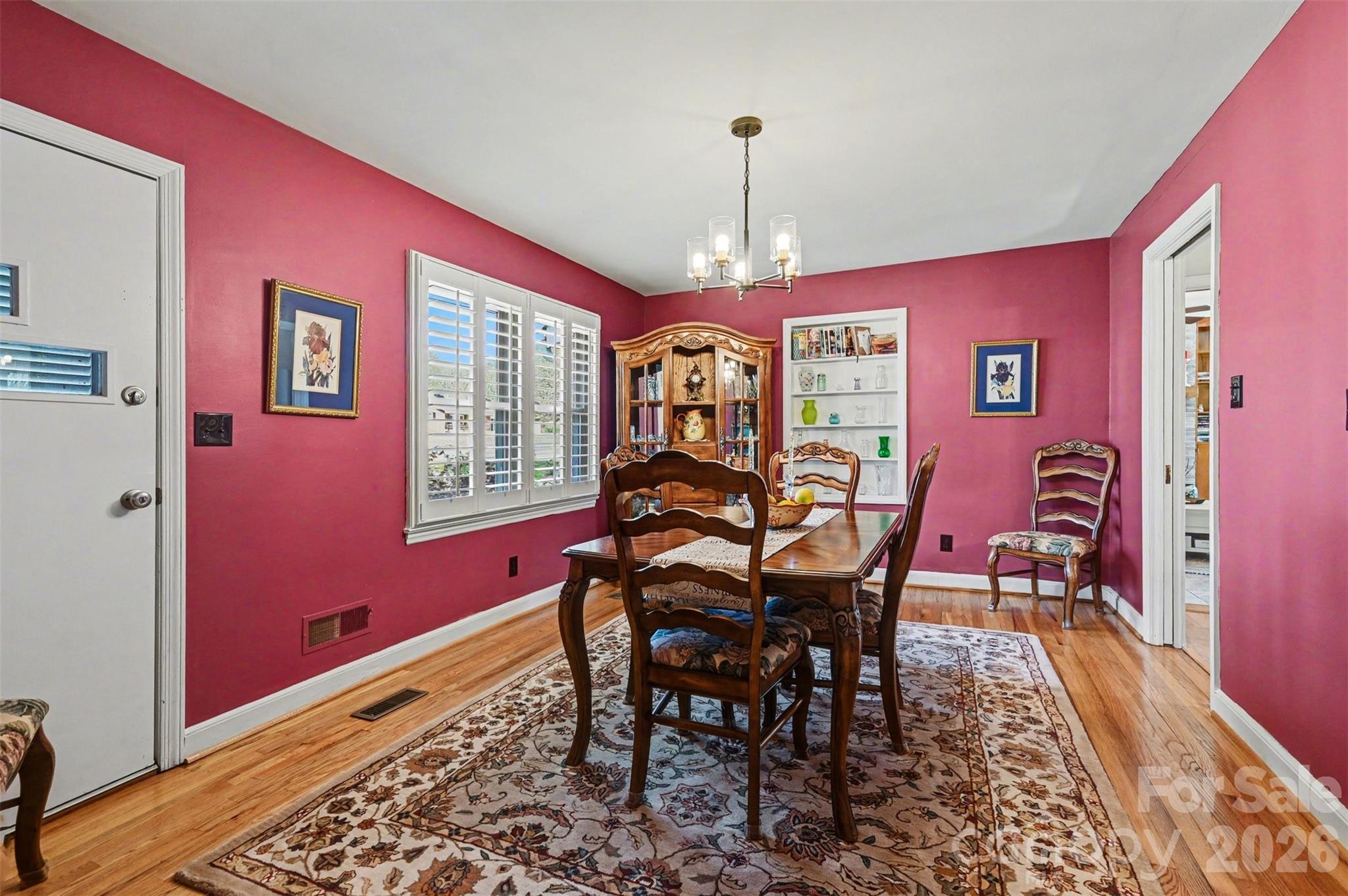 2008 Kings Road Shelby, NC 28150 - Photo 14 of 37 a view of a dining room with furniture window and wooden floor