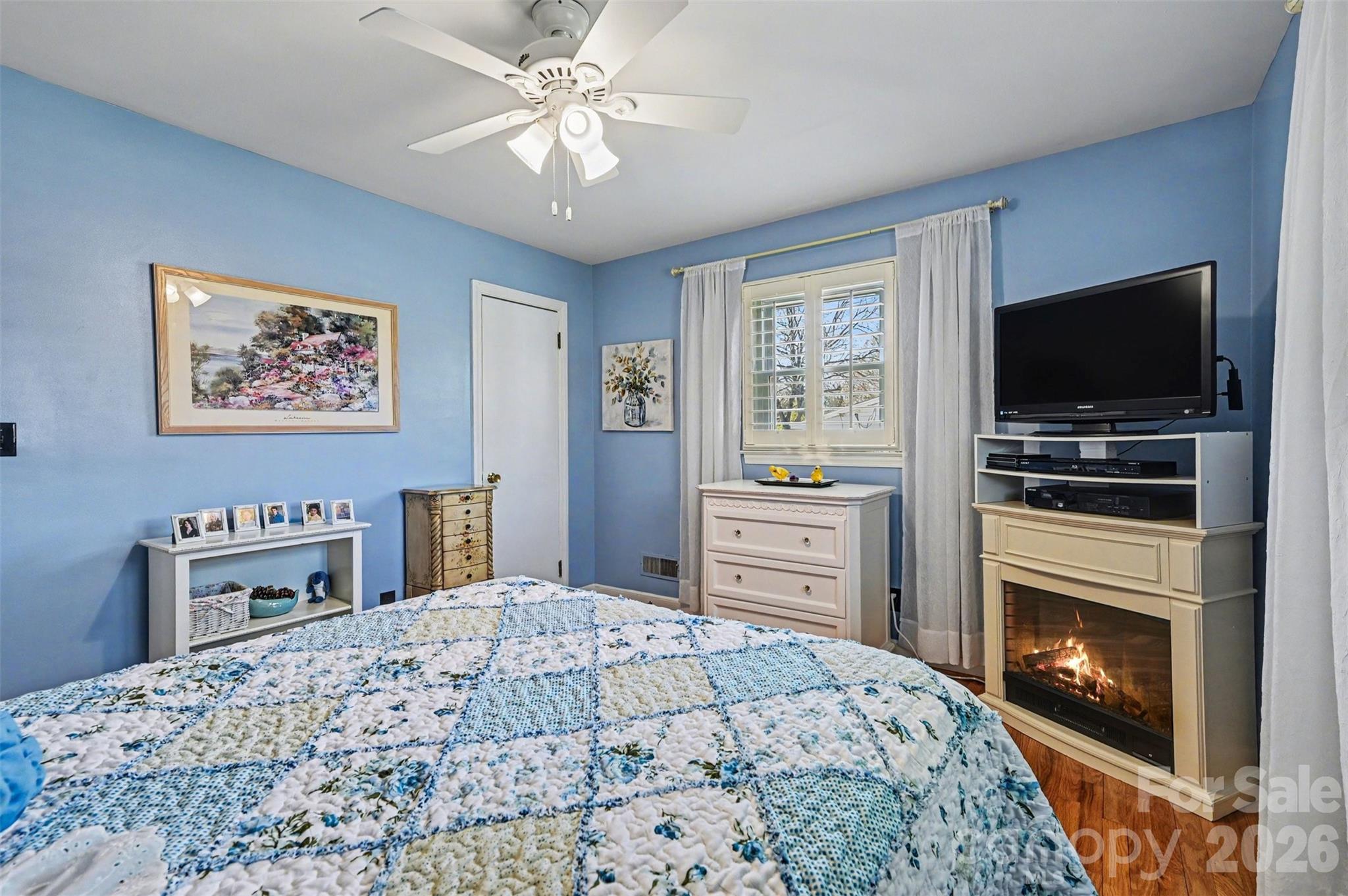 2008 Kings Road Shelby, NC 28150 - Photo 18 of 37 a bedroom with a bed dresser and a flat screen tv