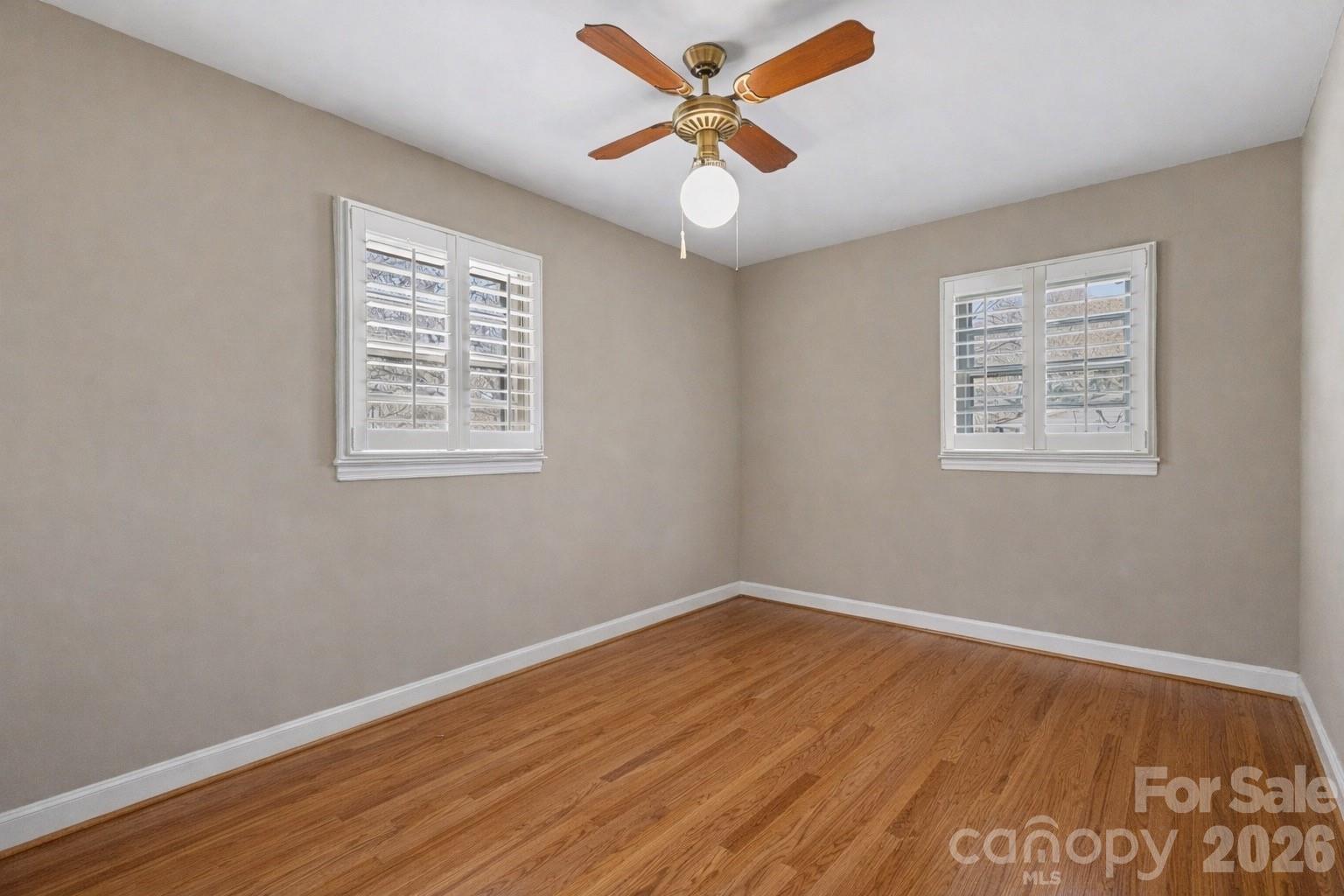 2008 Kings Road Shelby, NC 28150 - Photo 20 of 37 a view of an empty room with window and wooden floor
