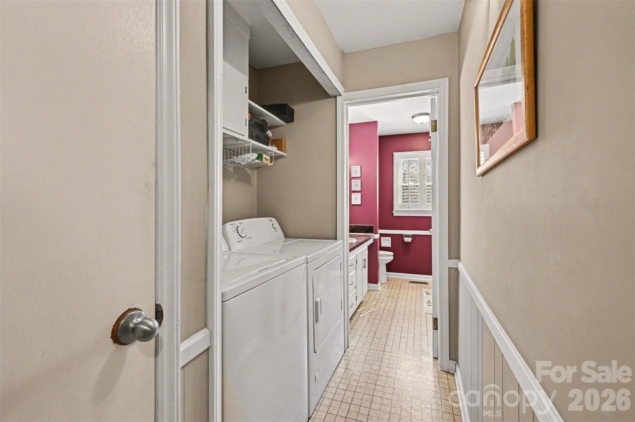 2008 Kings Road Shelby, NC 28150 - Photo 23 of 37 a view of a hallway with washer and dryer