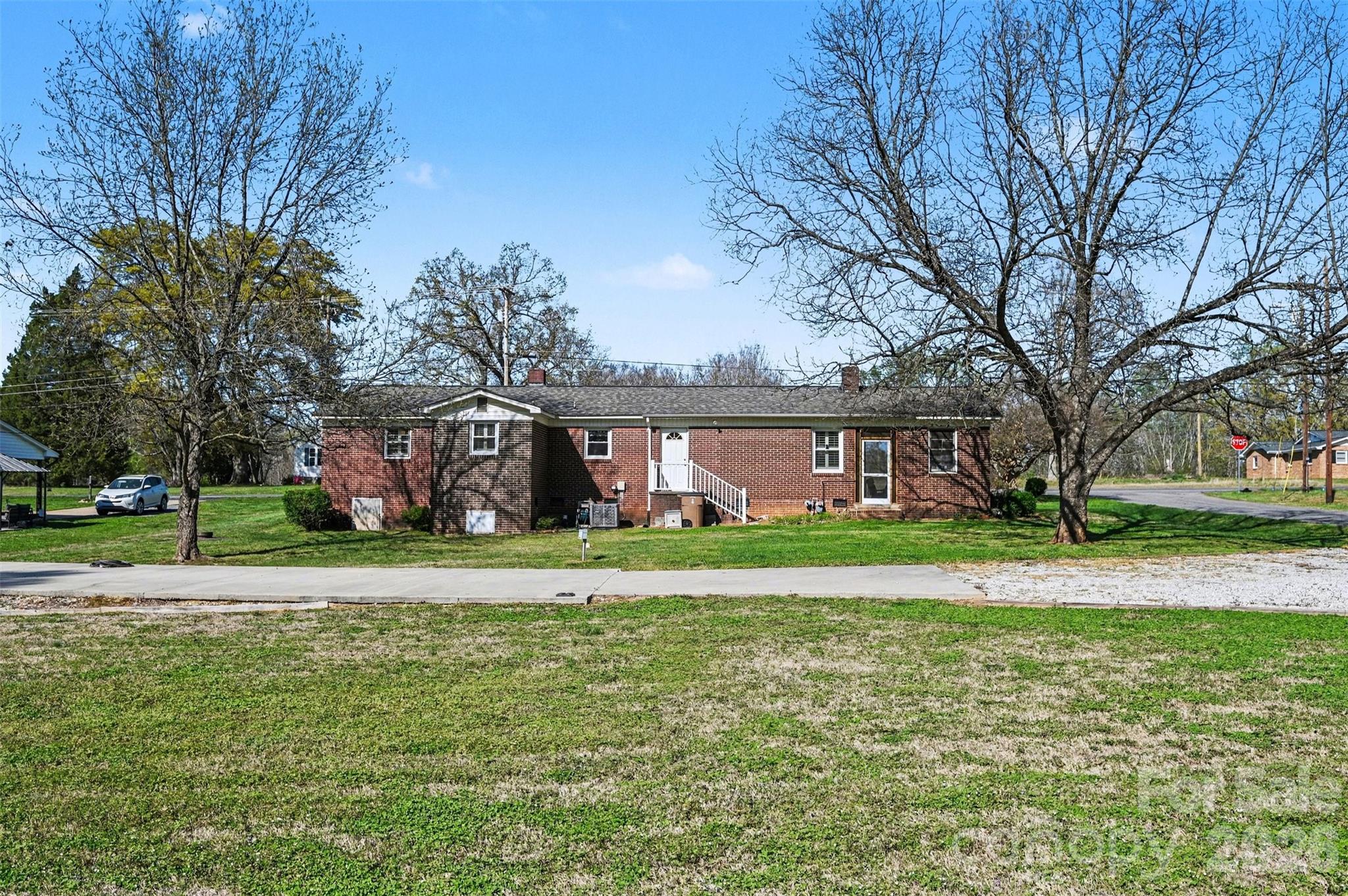 2008 Kings Road Shelby, NC 28150 - Photo 27 of 37 a view of a big house with a big yard and large trees