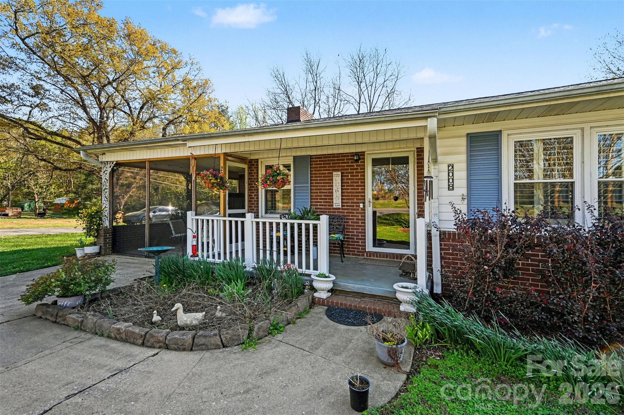 2008 Kings Road Shelby, NC 28150 - Photo 4 of 37 front view of a house with a porch