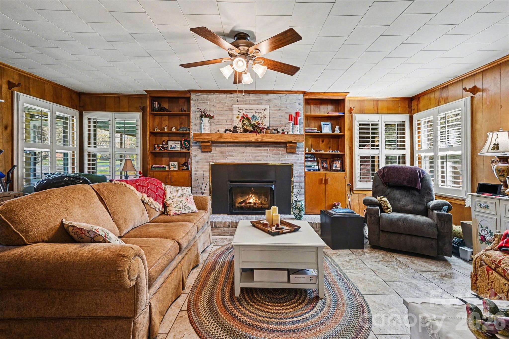 2008 Kings Road Shelby, NC 28150 - Photo 7 of 37 a living room with furniture a fireplace and a large window