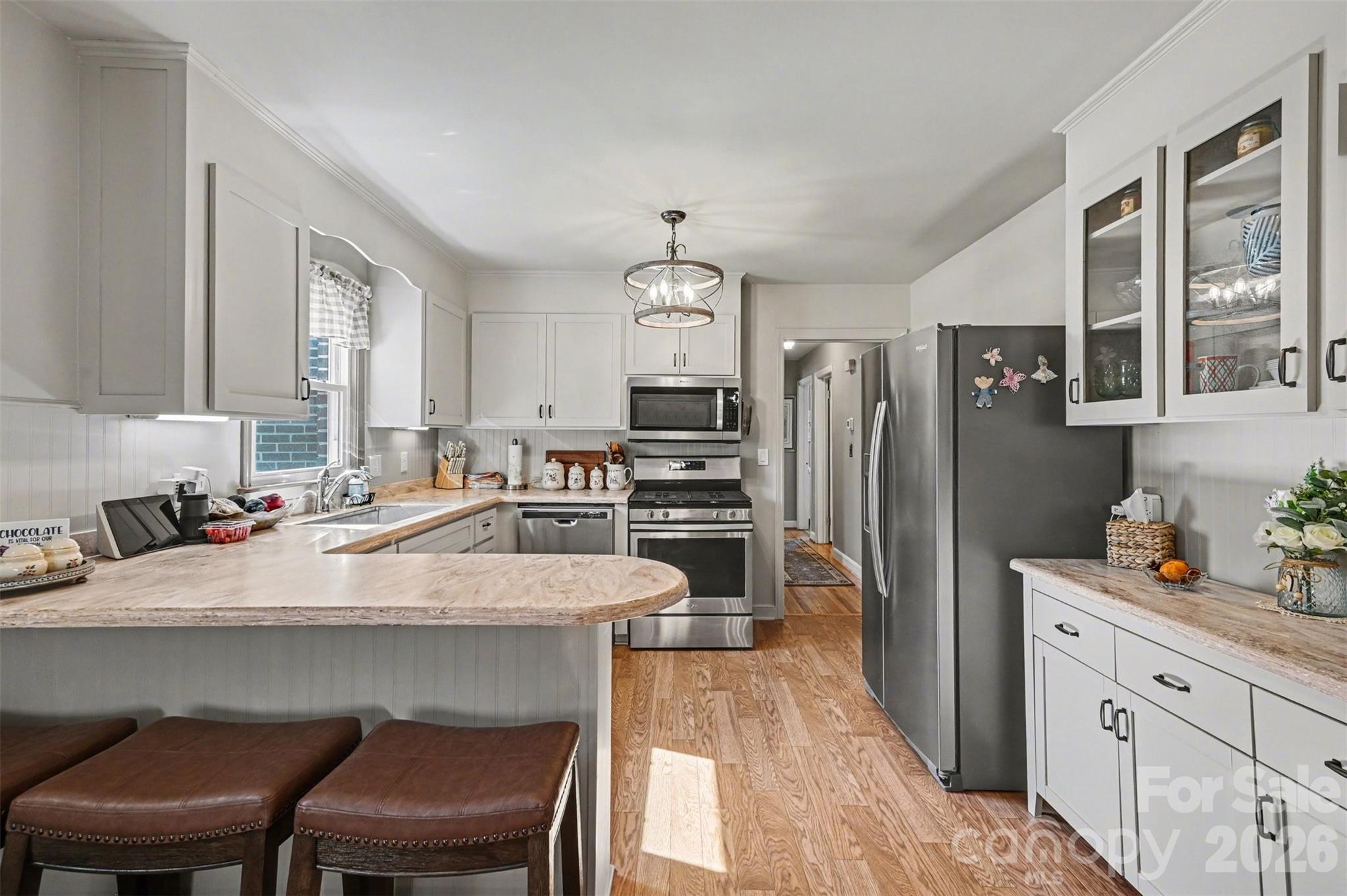 2008 Kings Road Shelby, NC 28150 - Photo 10 of 37 a large kitchen with a table chairs refrigerator and cabinets
