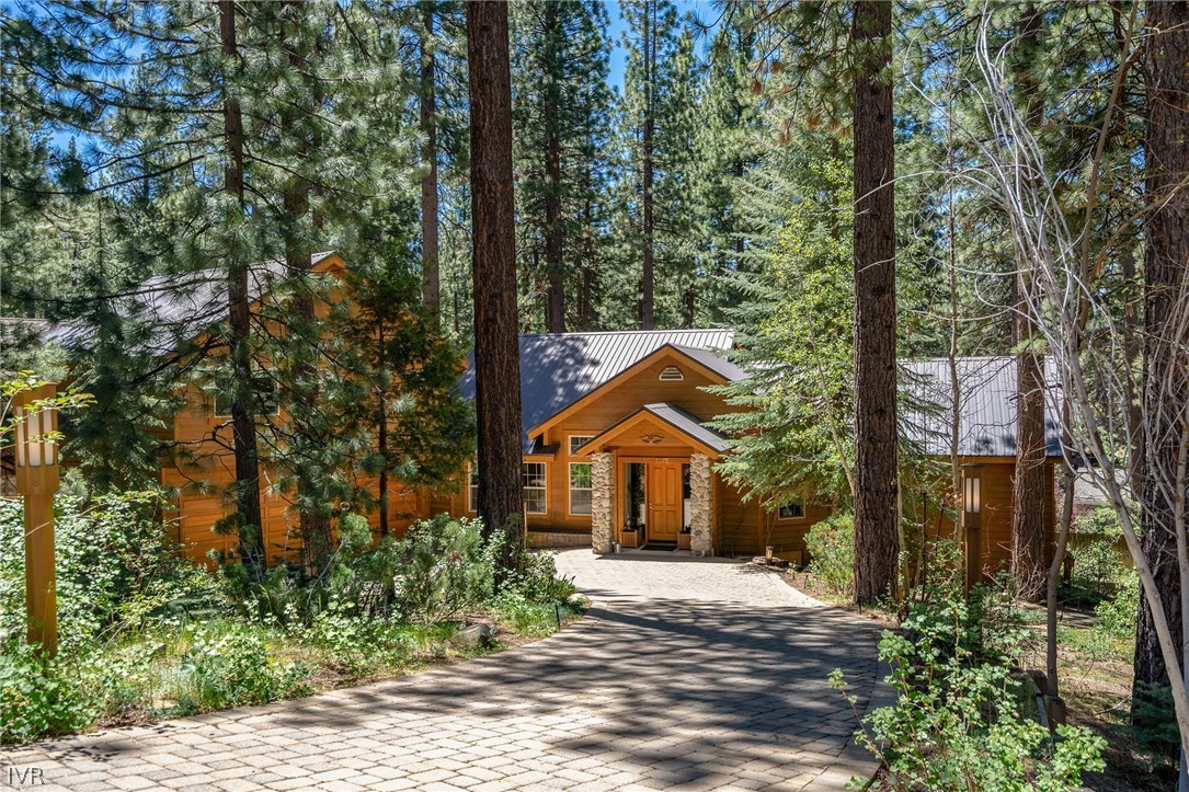 1075 Oxen Road Incline Village, NV 89451 - Photo 12 of 12 a front view of a house with a yard and tree s