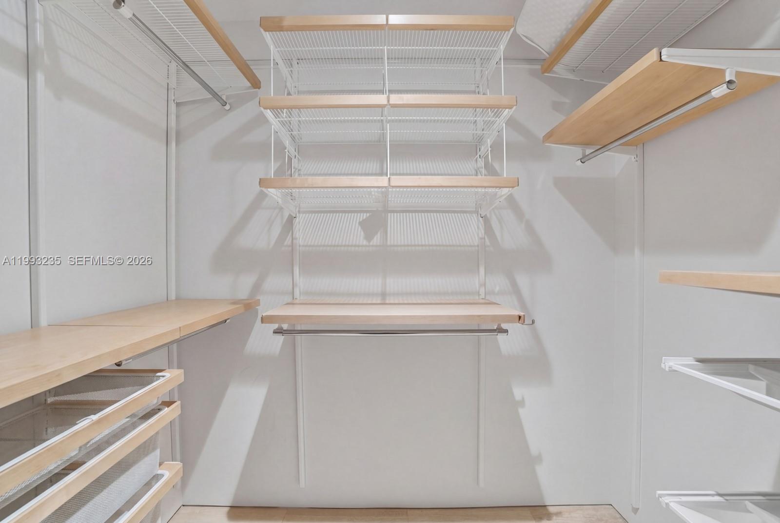 9111 Collins Avenue, Unit N717 Surfside, FL 33154 - Photo 40 of 68 a view of walk in closet