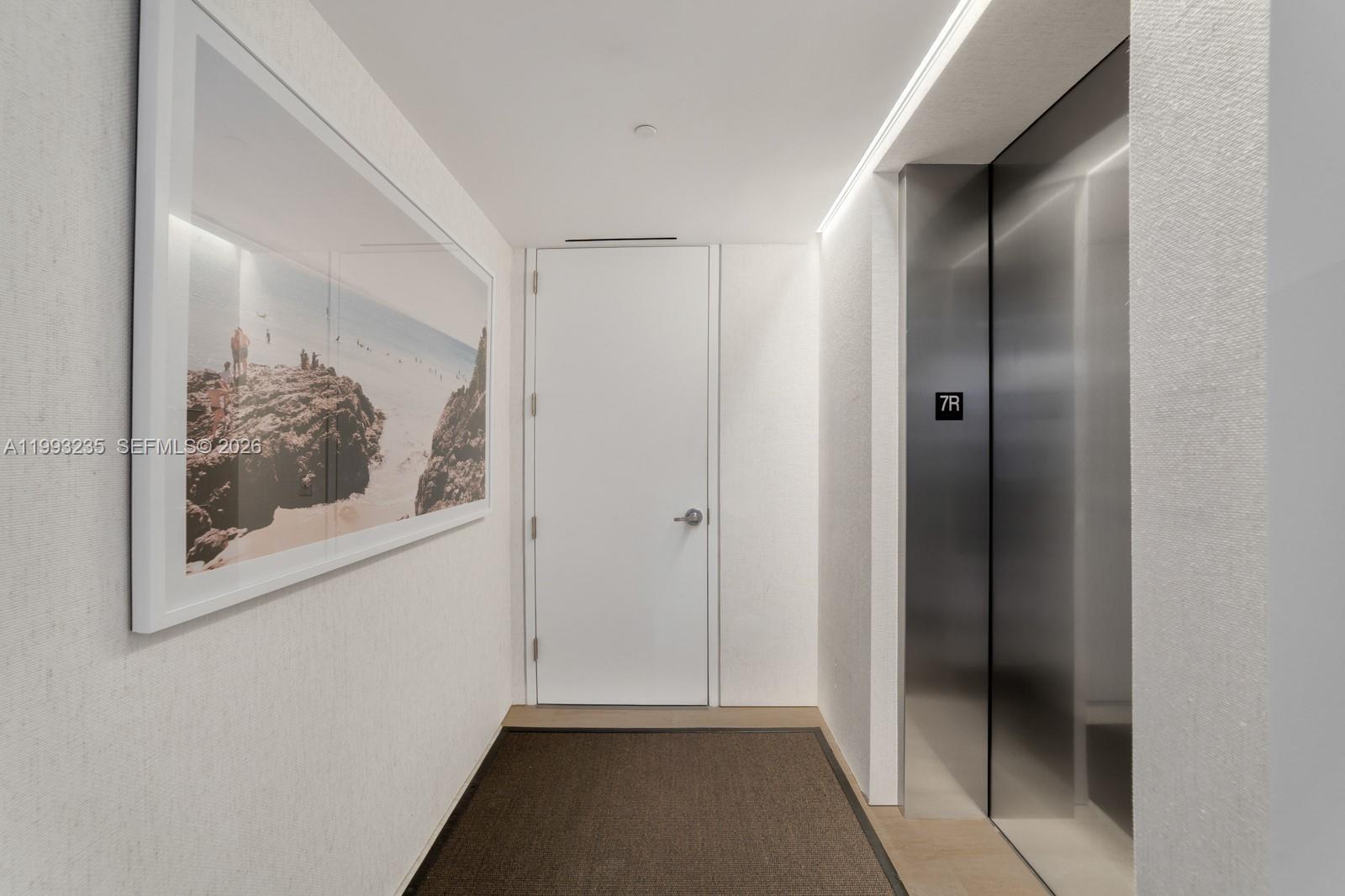 9111 Collins Avenue, Unit N717 Surfside, FL 33154 - Photo 49 of 68 a view of a hallway
