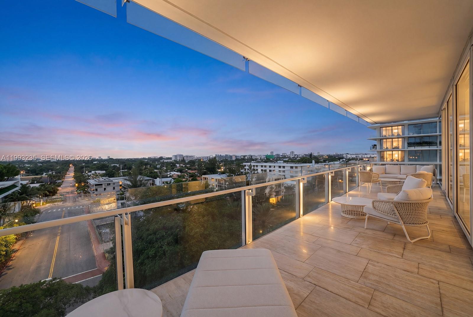 9111 Collins Avenue, Unit N717 Surfside, FL 33154 - Photo 52 of 68 a view of a balcony with a patio