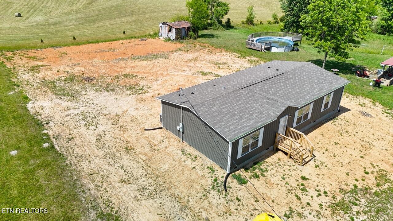 620 Pates Hill Road Mosheim, TN 37818 - Photo 36 of 51 Drone left view