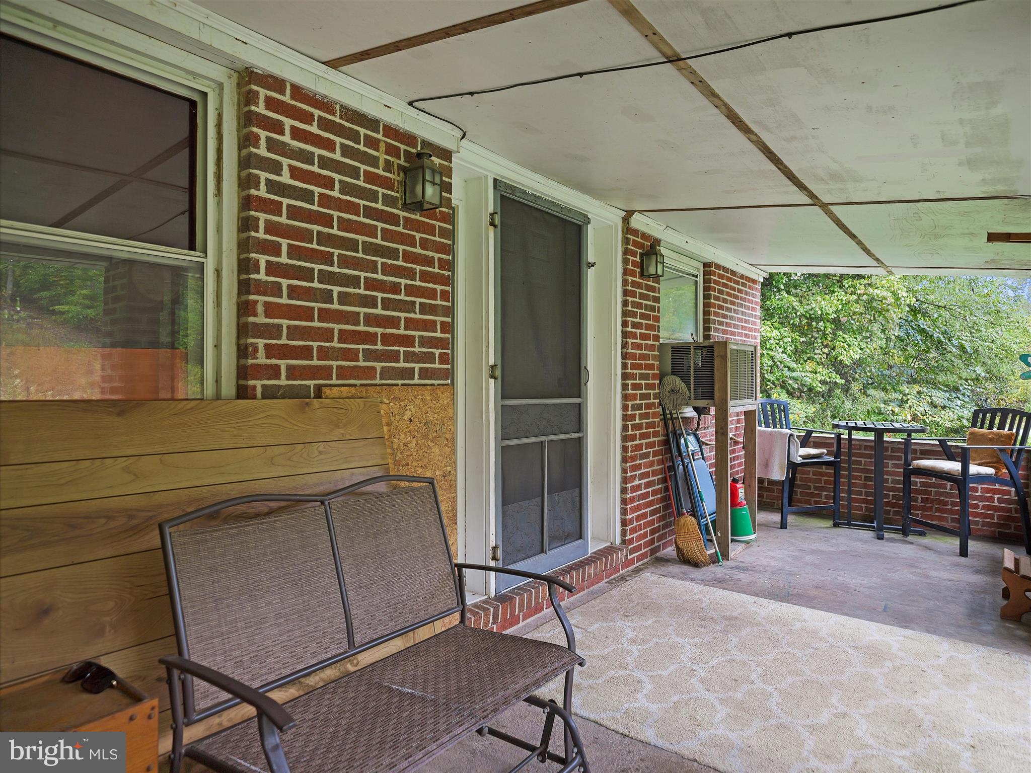 878 Co Rte 2/3 Hedgesville, WV 25427 - Photo 7 of 20 a backyard of a house with barbeque oven table and chairs
