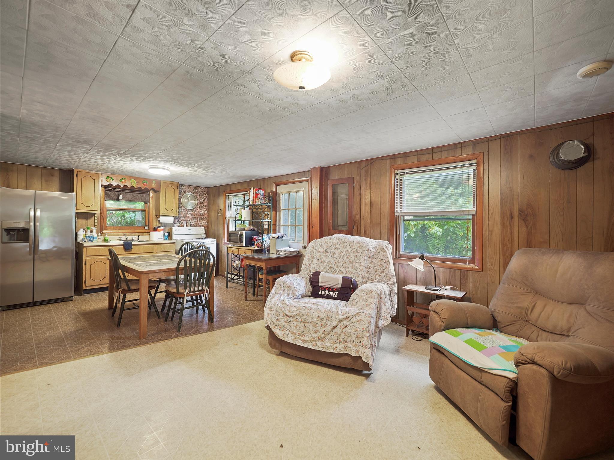 878 Co Rte 2/3 Hedgesville, WV 25427 - Photo 8 of 20 a living room with furniture and a large window