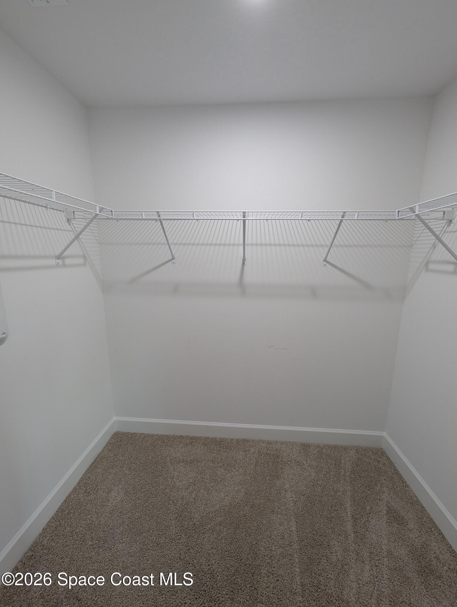 1356 Torgerson Road Southeast Palm Bay, FL 32909 - Photo 40 of 46 Walk in Closet in primary Bedroom
