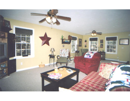 39 Leno Road Holland, MA 01521 - Photo 4 of 7 a living room with furniture and a large window
