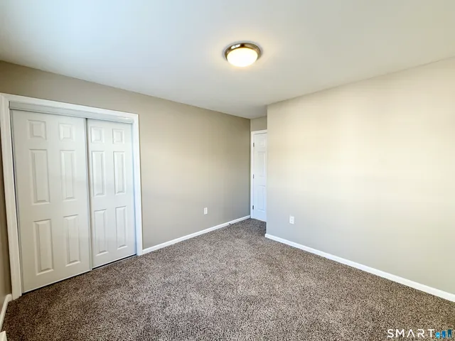 an empty room with a workbench