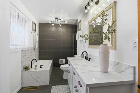 a bathroom with a sink and mirror