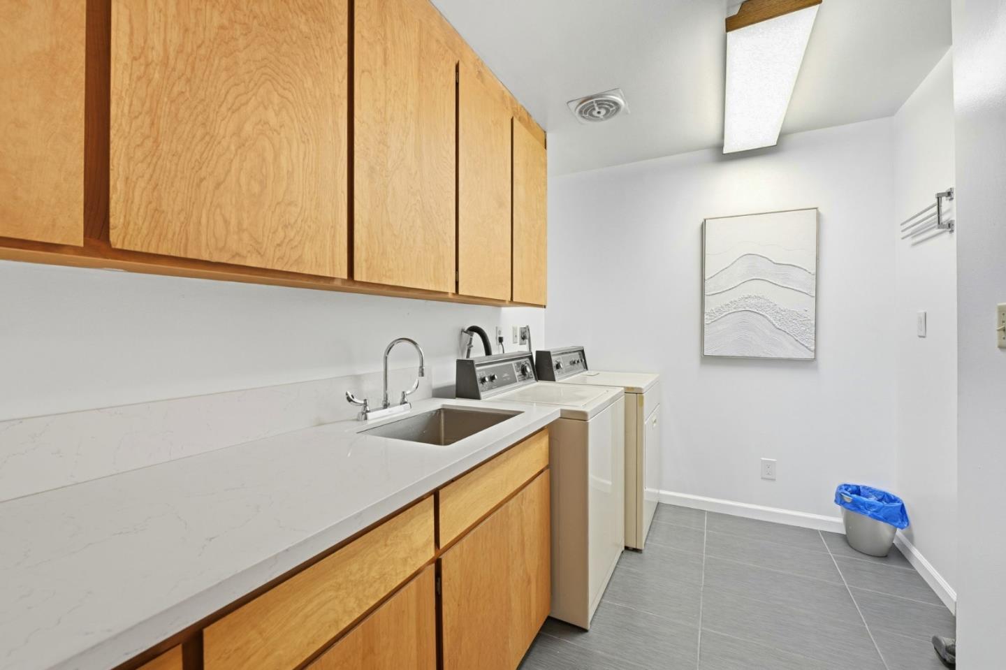 2 No Name Road Los Gatos, CA 95033 - Photo 21 of 37 a utility room with sink dryer and washer