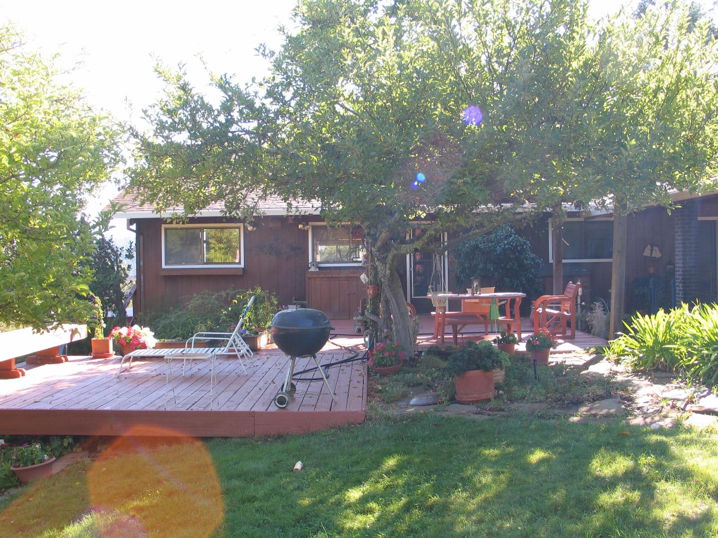2 No Name Road Los Gatos, CA 95033 - Photo 8 of 11 a view of a backyard with plants and patio