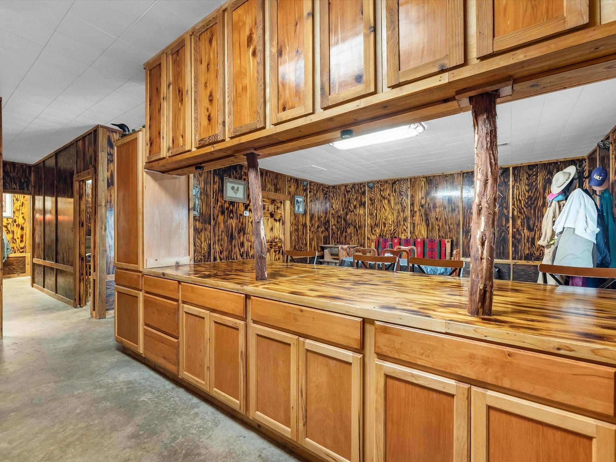 5013 U-Pond Drive Angleton, TX 77515 - Photo 3 of 8 a view of a kitchen with stainless steel appliances granite countertop a sink and cabinets