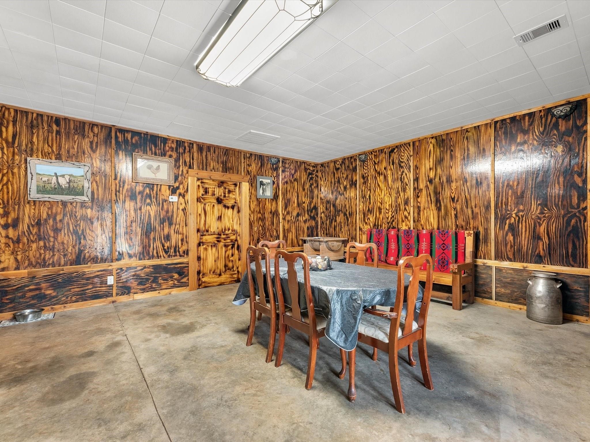 5013 U-Pond Drive Angleton, TX 77515 - Photo 6 of 8 a dining room with furniture and a large window