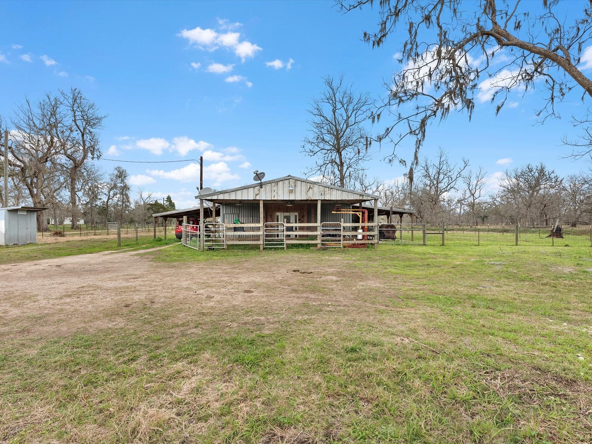 5013 U-Pond Drive Angleton, TX 77515 - Photo 8 of 8 a view of a house with a yard
