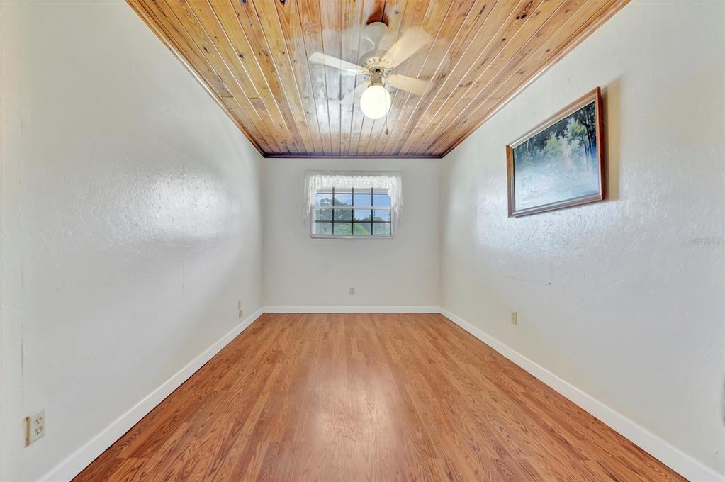 7015 Spears Road Plant City, FL 33567 - Photo 14 of 77 a view of empty room with windows