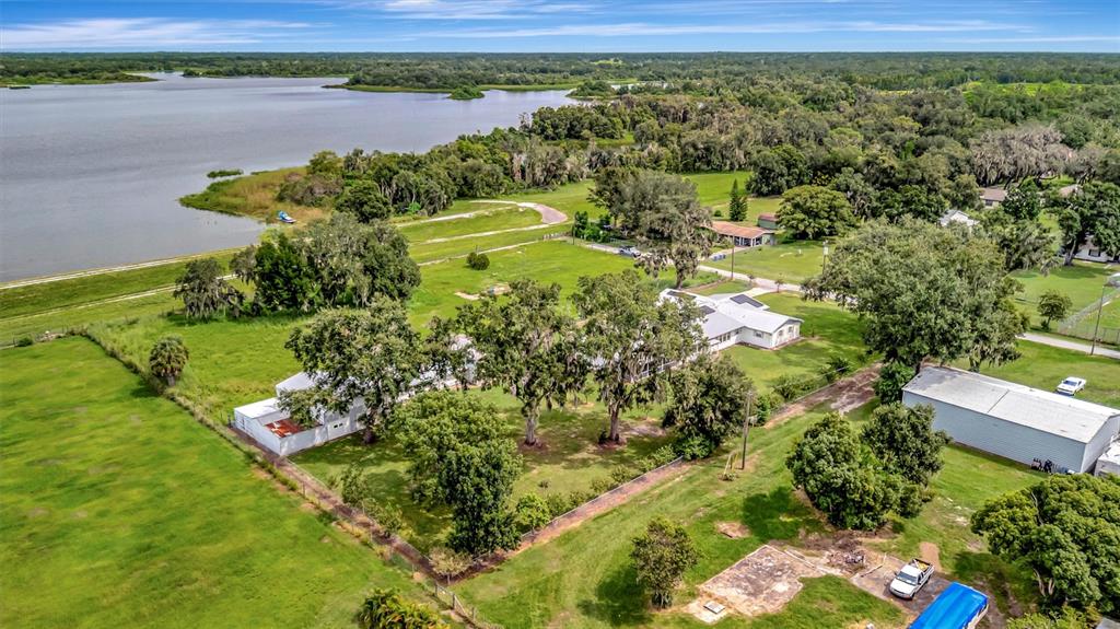 7015 Spears Road Plant City, FL 33567 - Photo 59 of 77 a view of a lake with a yard