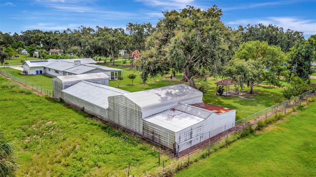 7015 Spears Road Plant City, FL 33567 - Photo 64 of 77 a view of a house with a yard and sitting area
