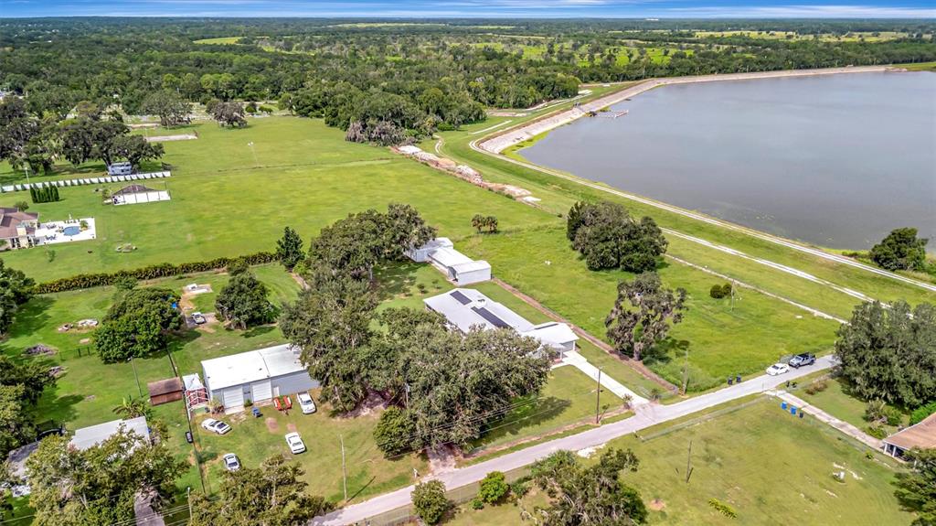 7015 Spears Road Plant City, FL 33567 - Photo 66 of 77 a view of a lake with a yard