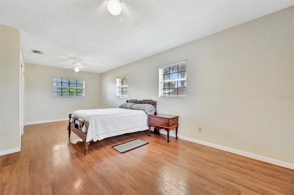 7015 Spears Road Plant City, FL 33567 - Photo 9 of 77 a bedroom with a bed and a window