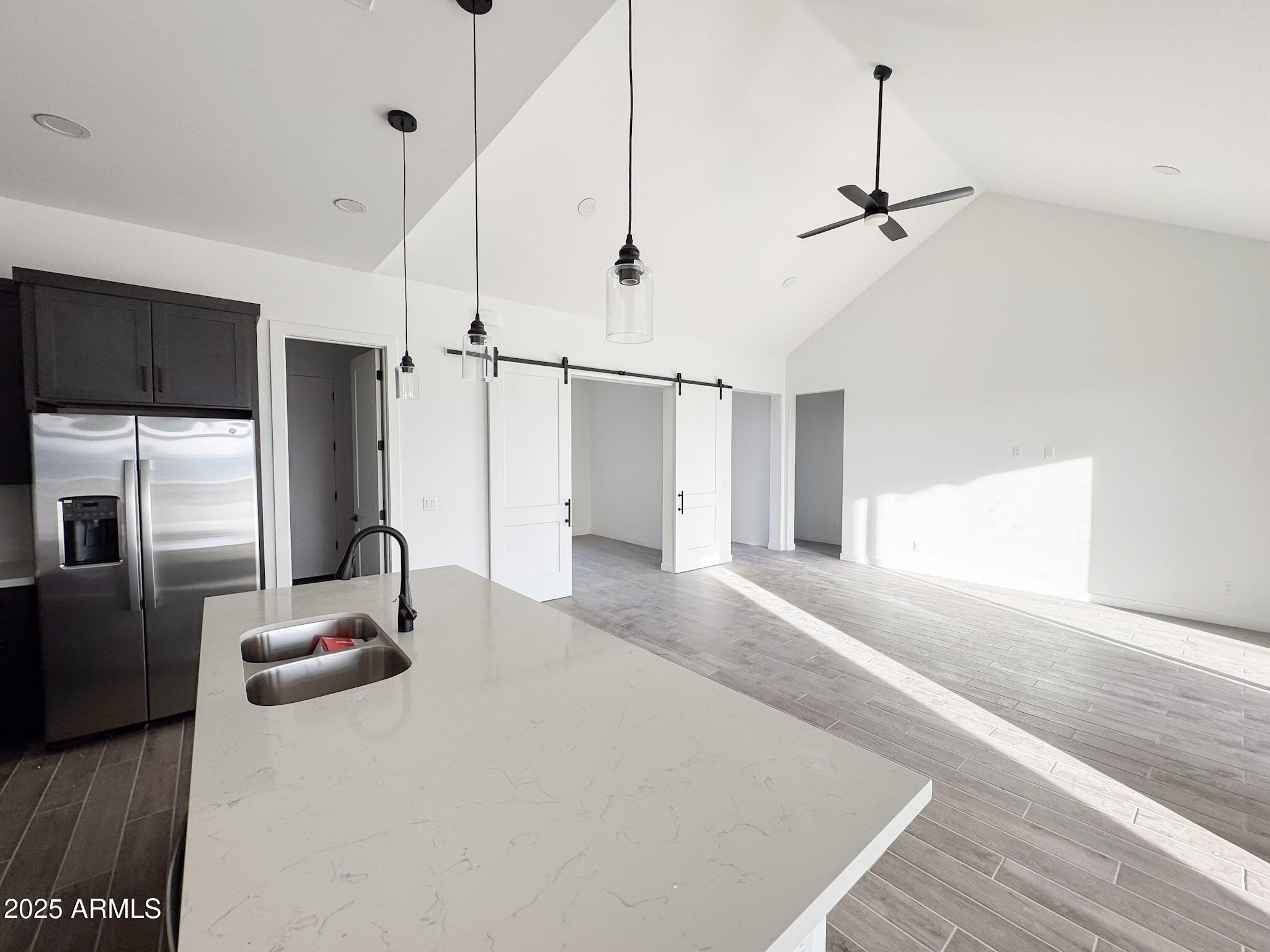16143 East Lowden Court Scottsdale, AZ 85262 - Photo 10 of 20 a view of a kitchen with a sink and refrigerator