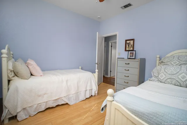 a bedroom with a bed and a closet