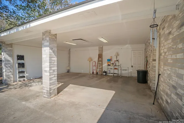 a view of a livingroom with table and chair